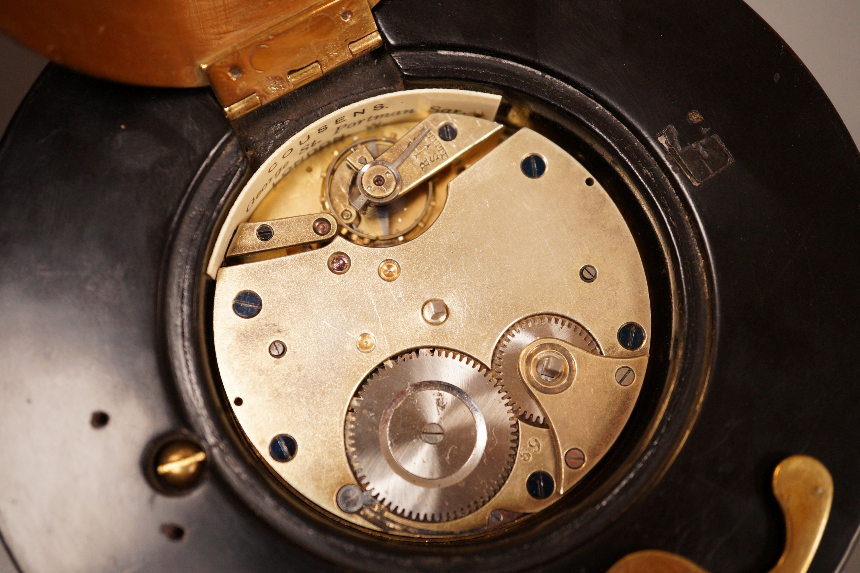 A George III brass and ebonised wood sedan timepiece, 1£cm diameter